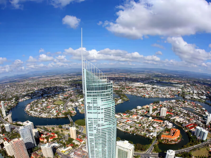 Dad and son looking through binoculars at SkyPoint