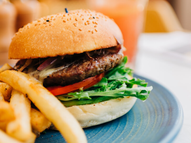 Image of a burger and fries on a plate