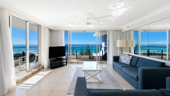 Coastal-style living area with full ocean views at ULTIQA Beach Haven on Broadbeach.