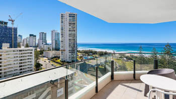 Private balcony with outdoor seating and ocean views at ULTIQA Beach Haven on Broadbeach.