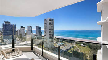 Private balcony with sweeping Gold Coast coastline views at ULTIQA Beach Haven on Broadbeach.