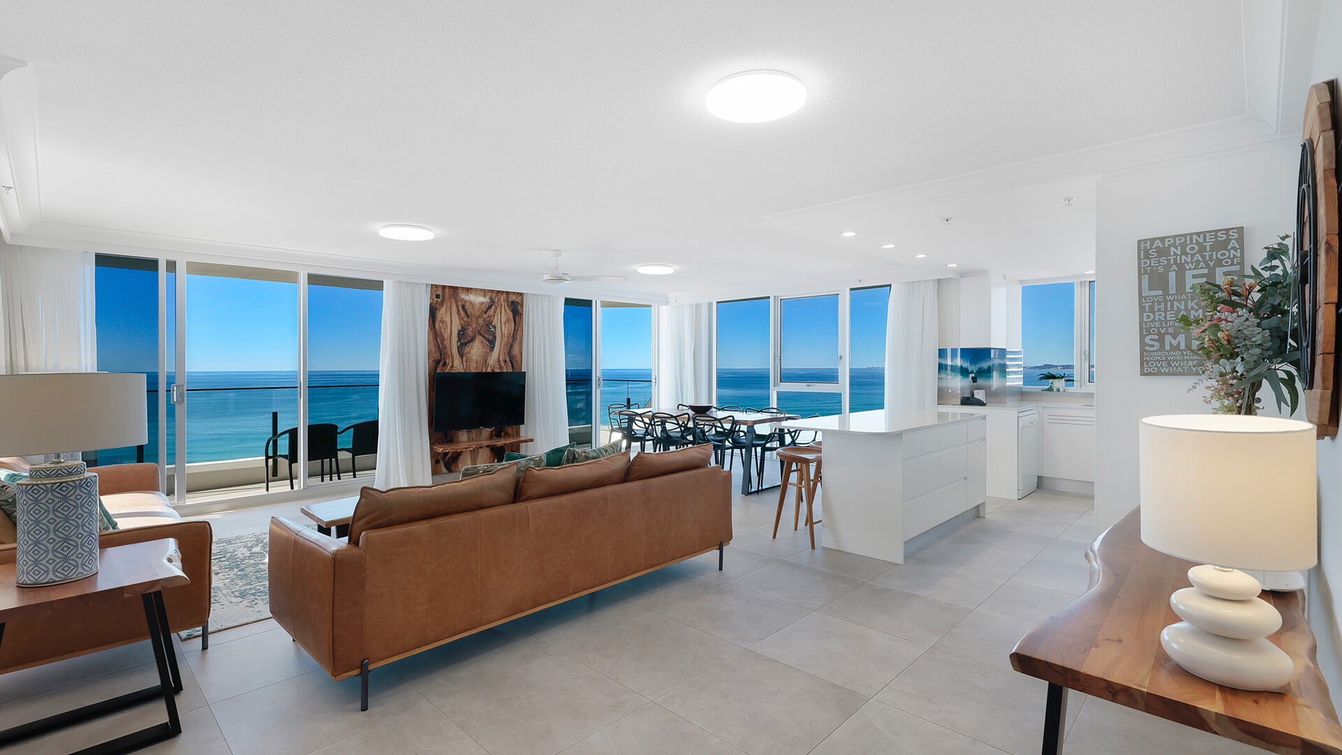 Spacious oceanfront living, dining and kitchen at ULTIQA Beach Haven on Broadbeach, Surfers Paradise, Gold Coast.