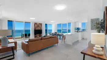 Spacious oceanfront living, dining and kitchen at ULTIQA Beach Haven on Broadbeach, Surfers Paradise, Gold Coast.